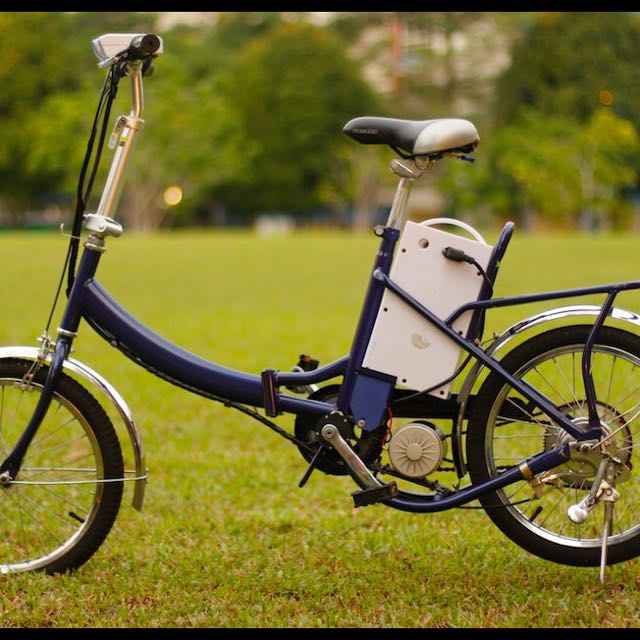 Used Electric Motorized Foldable Bicycle Sports On Carou Photo