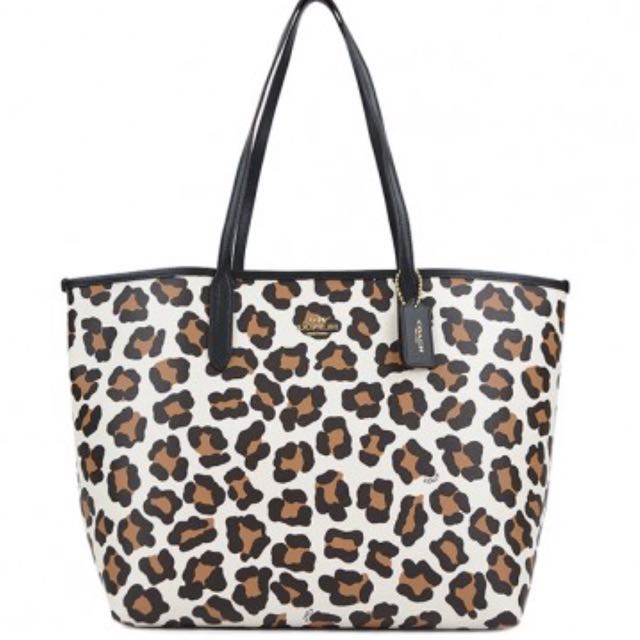 Coach Leopard Print Corner Zip Small Wristlet 66053 : Amazon.in: Shoes &  Handbags