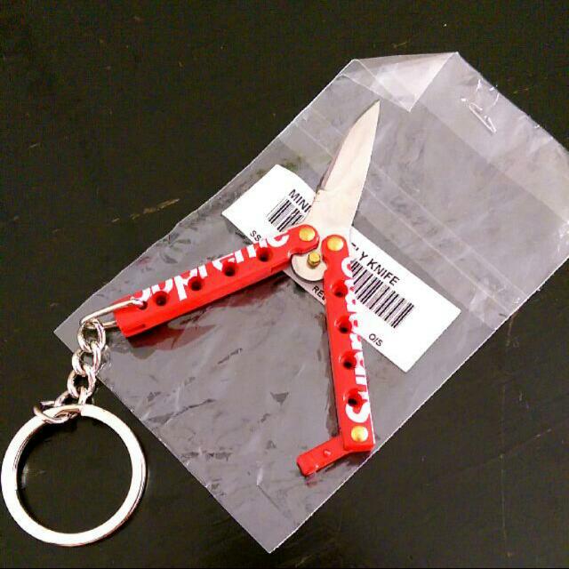 Supreme butterfly sales knife keychain red