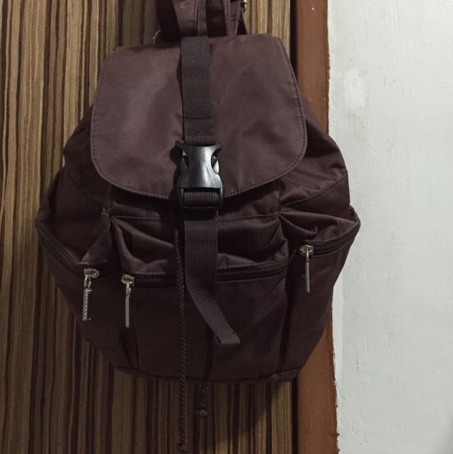 Brown Pullstring Backpack (Category: Backpacks) located in Singapore. Submitted by karinnyt (Listing ID 31838862, Image 1). Description: .