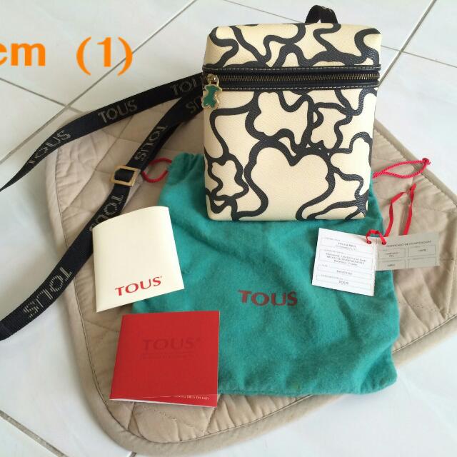 Tous sling bag sales