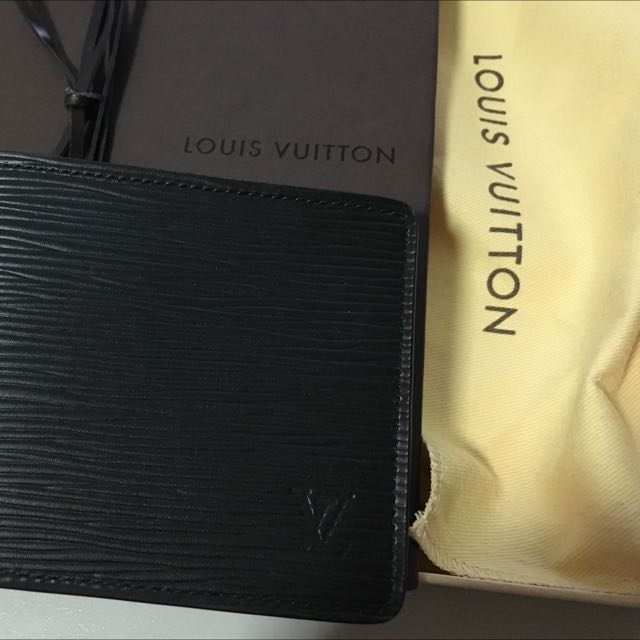 Louis Vuitton full leather slender wallet M60339 (Black), Luxury, Bags &  Wallets on Carousell