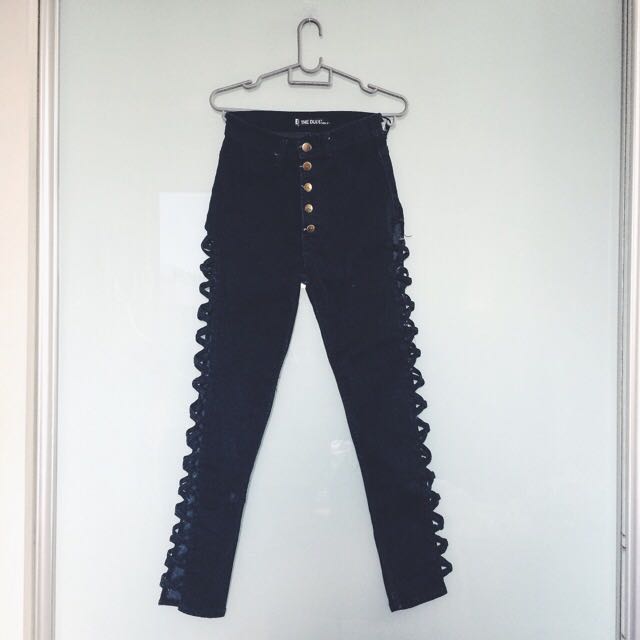 high waisted black cut up jeans