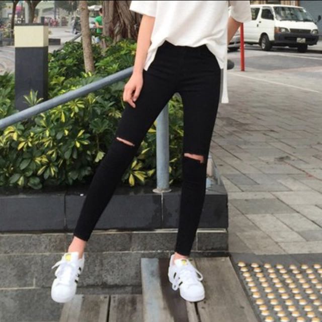 women's black jeans with knee slits