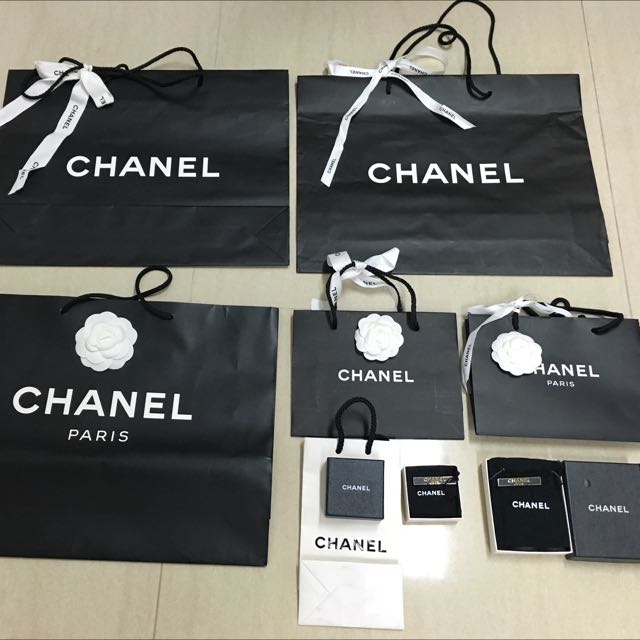 Chanel paper bag, Luxury, Bags & Wallets on Carousell