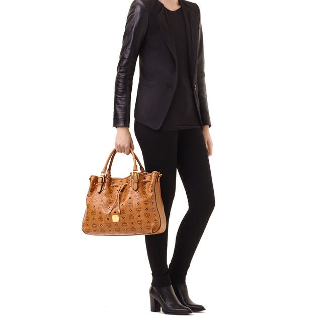 Mcm gold visetos deals drawstring medium cognac