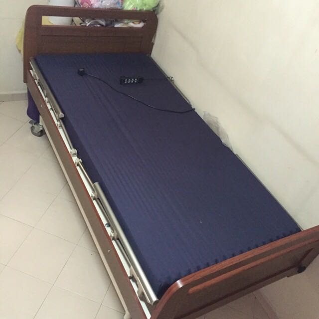 Auto Wooden Hospital Bed, Furniture & Home Living, Furniture, Bed Frames & Mattresses on Carousell