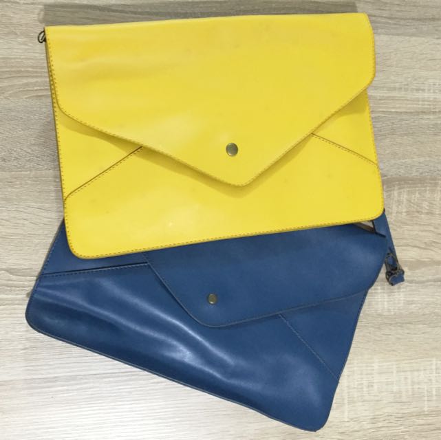 blue and yellow clutch bag