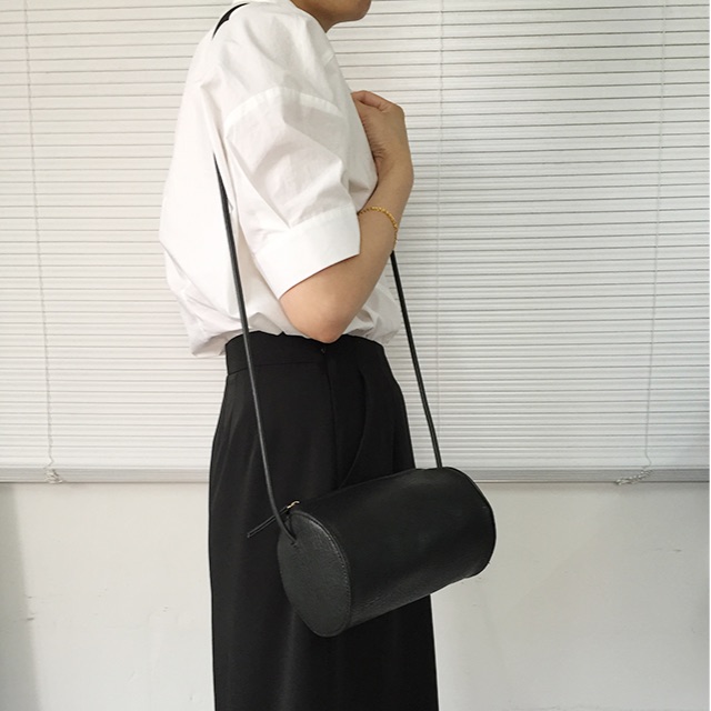 Cylinder sling hotsell bag