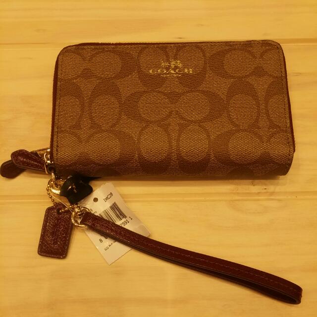 Coach zip phone wallet clearance