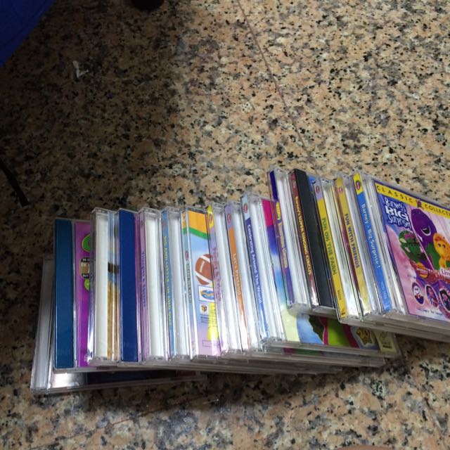 16 Barney VCDs, Babies & Kids on Carousell