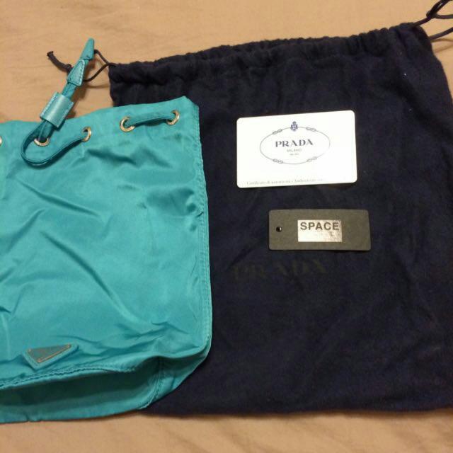 Authentic Prada Drawstring Bag (Category: Tote Bags) located in Singapore. Submitted by itemsnotinuse (Listing ID 38559077, Image 2). Description: .
