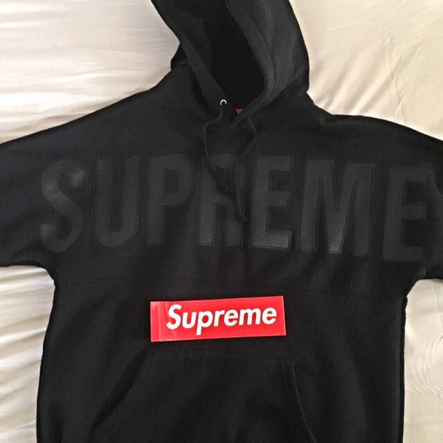 Supreme banner on sale hoodie