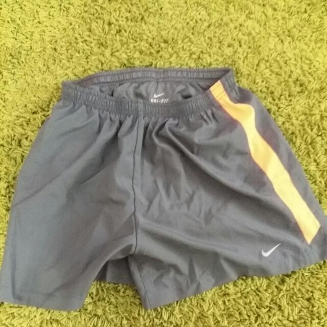 grey and orange nike shorts