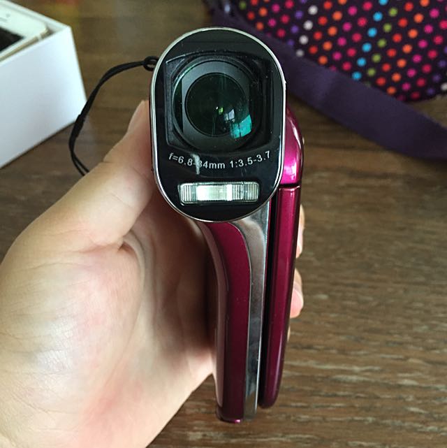 Sanyo Xacti CG100 Dual Camera -Pls read description! (Category: Cameras) located in Singapore. Submitted by sherimao (Listing ID 39171251, Image 1). Description: - wine red - for taking Videos and pictures - in very good condition - comes with an extra battery pack - 16gb memory card - comes with everything in last pic+instruction manual and box - Meet-ups in the East edit: I think the batt pack needs to be changed, the ones I have currently don'