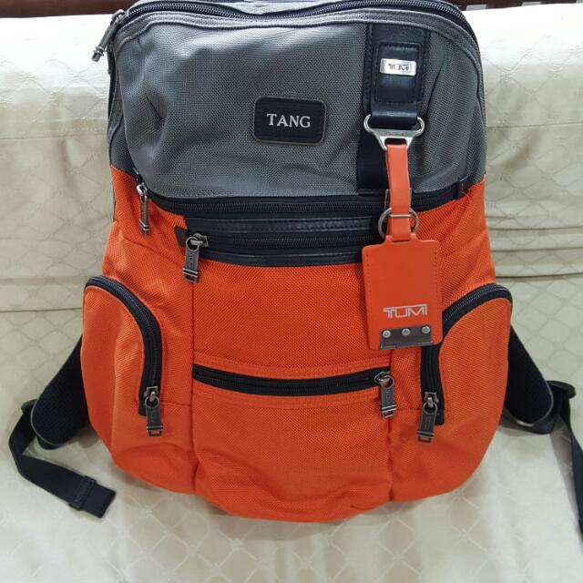 Tumi orange backpack cheap