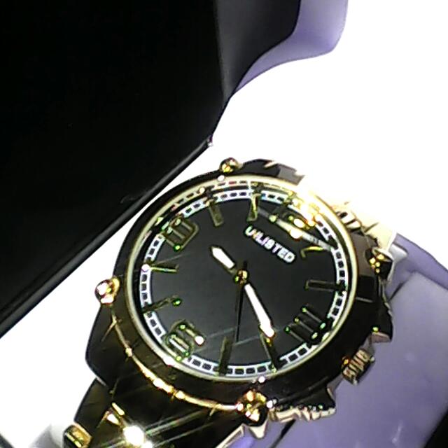 Unlisted gold watch top