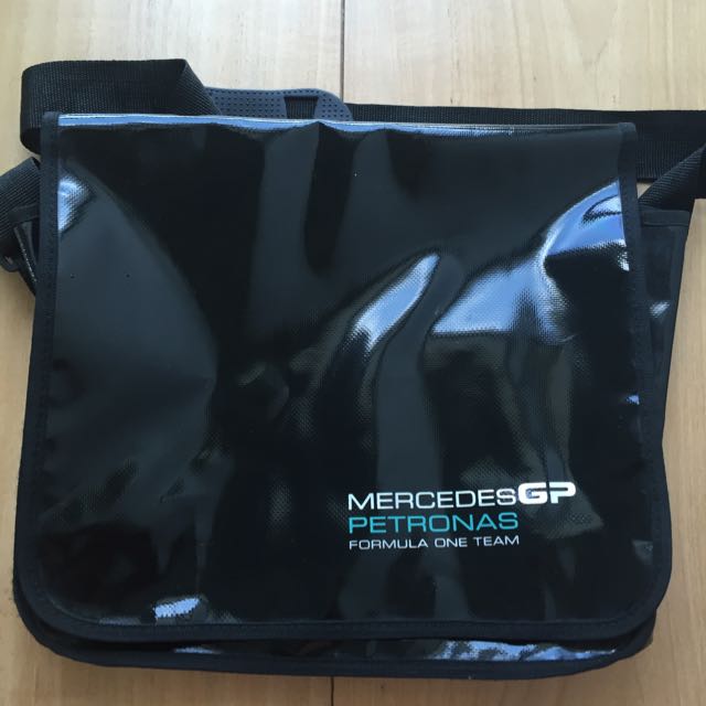 Mercedes GP Petronas Formula One Team Team Messenger Bag (Category: Belt bags, Clutches and Pouches) located in Singapore. Submitted by filiaebear (Listing ID 41638371, Image 1). Description: .