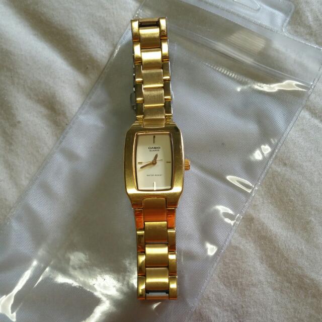 Gold rectangular shop women's watch