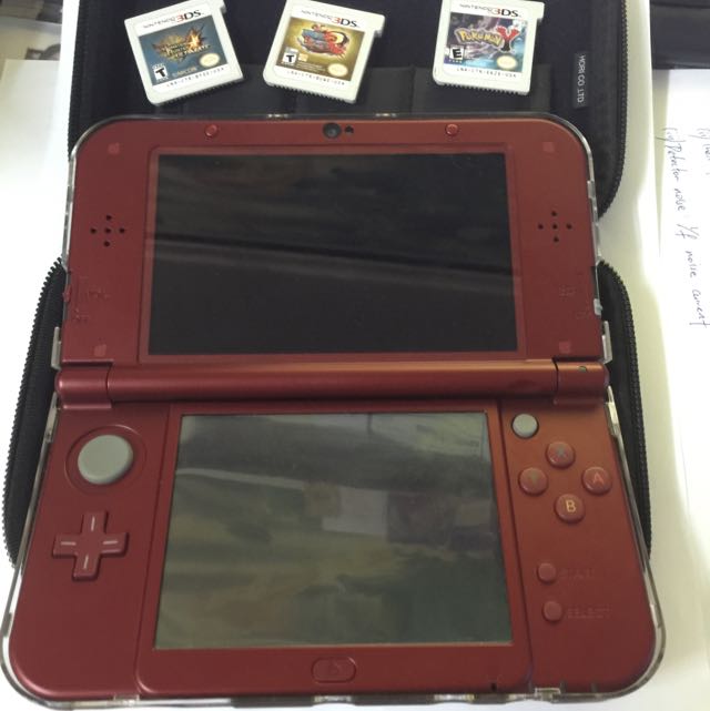 Selling used New 3DS XL mint condition with games included, Hobbies