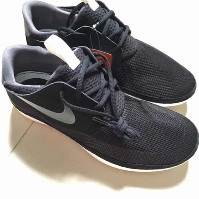 nike solarsoft moccasin on feet
