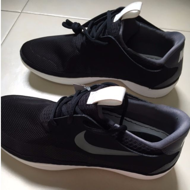 nike solarsoft moccasin on feet