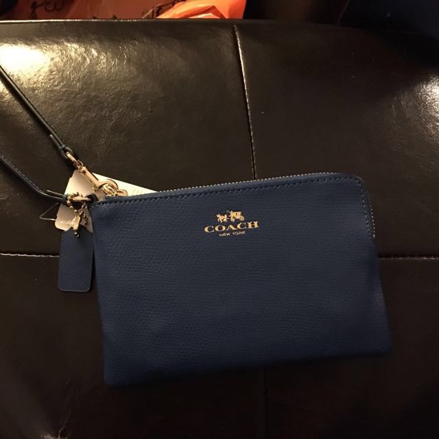 navy blue coach wristlet