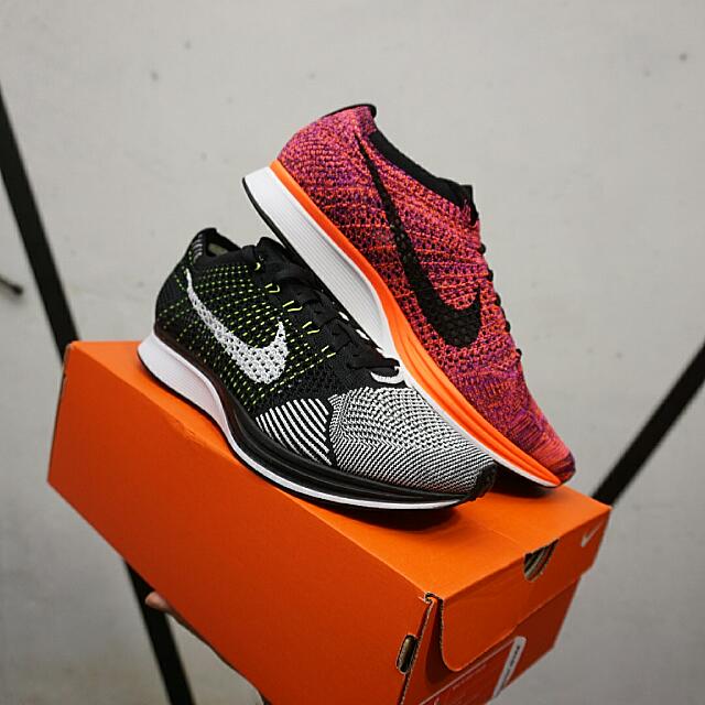 nike flyknit racer orange black
