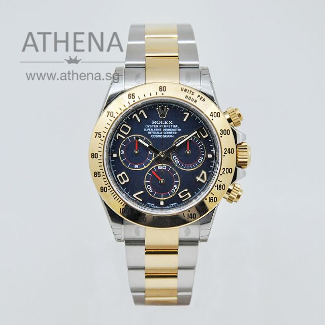 Rolex half gold top daytona