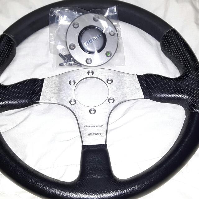rigtig meget Bygger fælde Authentic MOMO Champion Steering Wheel, Car Accessories on Carousell