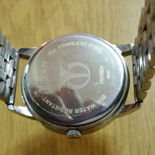 Titan 1584 sda watch price clearance
