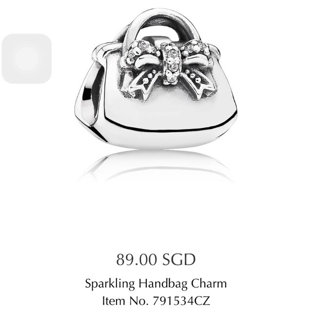 Sold at Auction: Sterling Silver Pandora Purse Charm