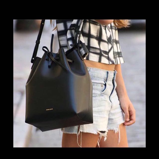 black bucket bag with red lining