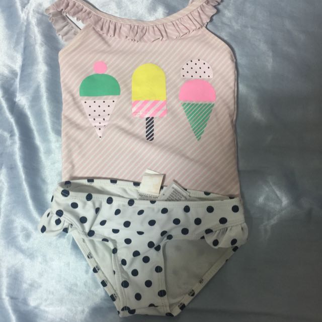 cream swimming costume