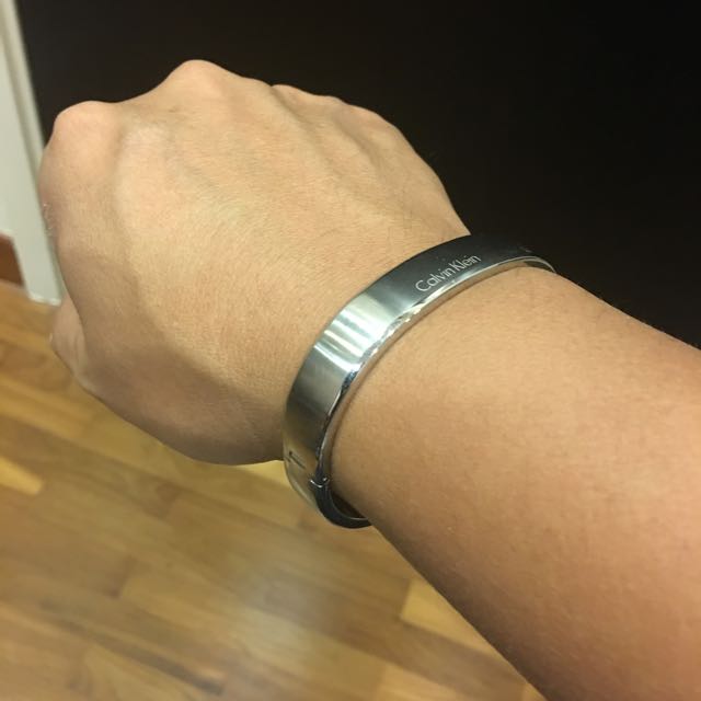Calvin Klein hook Bangle bracelet in silver *used size L/M, Men's Fashion,  Watches & Accessories, Jewelry on Carousell