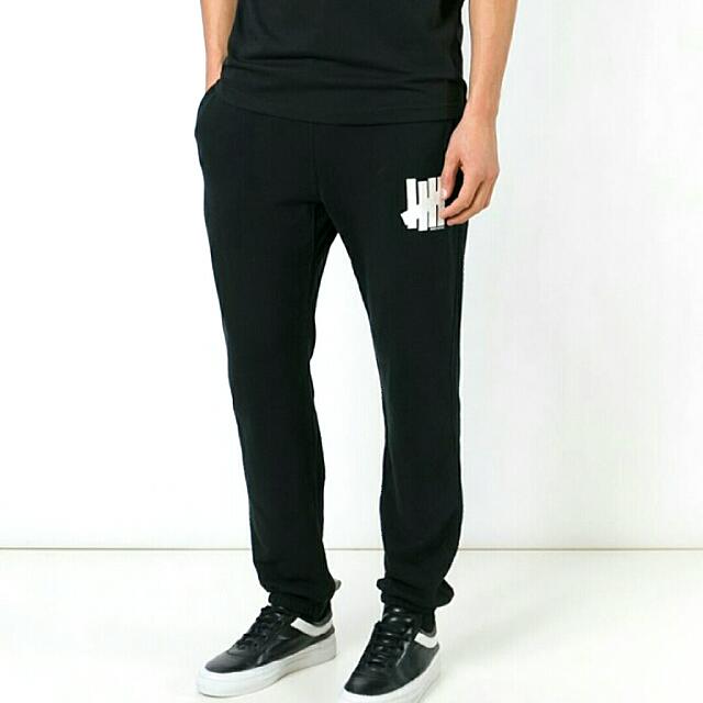 Undefeated joggers top