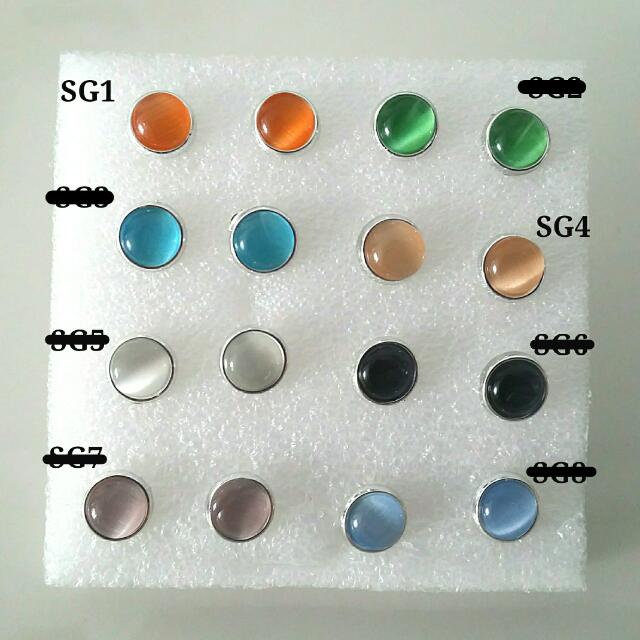 Silver Rimmed Cat s Eye Gemstone Plastic Ear Studs Earrings Women s Fashion Jewelry Organisers Earrings on Carousell
