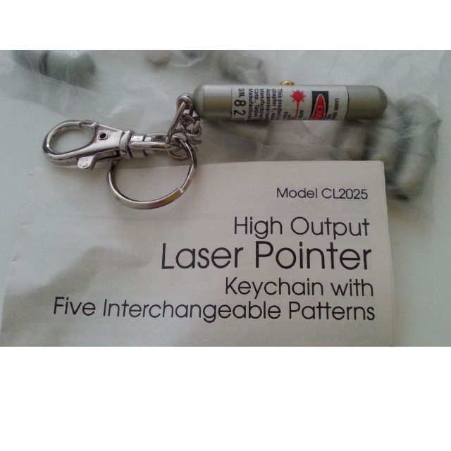 Laser pointer keychains (Category: Networking) located in Singapore. Submitted by 99.rainbow (Listing ID 51992007, Image 1). Description: Mini red-light laser pointer with 5 interchangeable caps a set. In new condition 9/10, just not in original packaging. 2 sets available.
