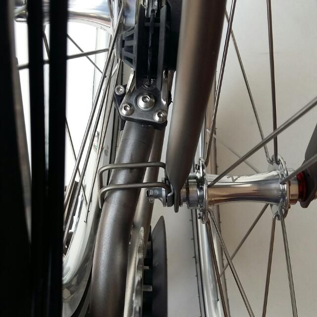 Brompton Titanium E Hook Version 2.0 (Category: Parts & Accessories) located in Singapore. Submitted by kiong. (Listing ID 30780819, Image 3). Description: Titanium e hook(direct replacement). For brompton without mudguards only. Anti rust and lightweight Ti6Al4V titanium. Weight reduced from 31g to 6g! Color : silver / black ($18) *Note: To prevent scratching of the rear triangle, it is recommended to use this with a triangle guard/protector. Re