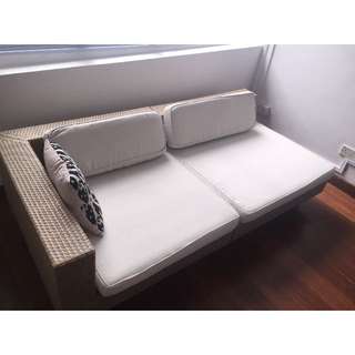 Rattan day bed with cushions