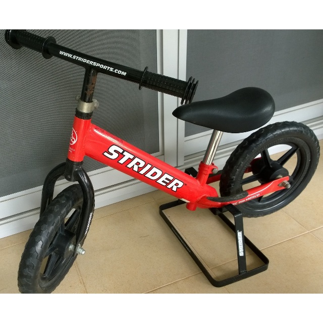 strider balance bike stand