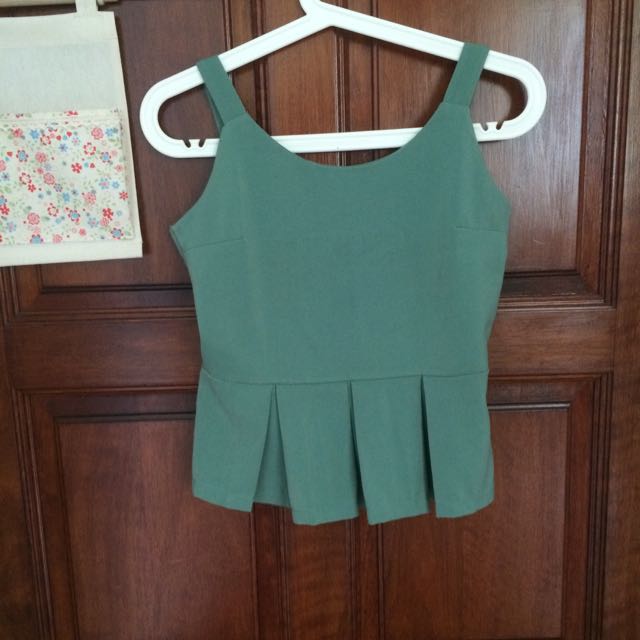 green peplum shirt