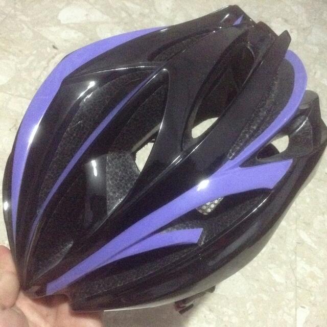 Black and purple bike helmet top