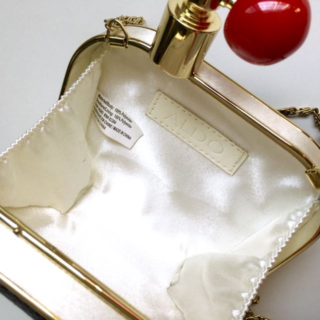 Aldo top perfume bag