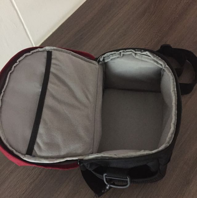 Camera Pouch (Category: Camera Bags & Carriers) located in Singapore. Submitted by abcfamily (Listing ID 57452118, Image 2). Description: In perfect condition, black color with red lining. Front, back, side and additional inner pocket..