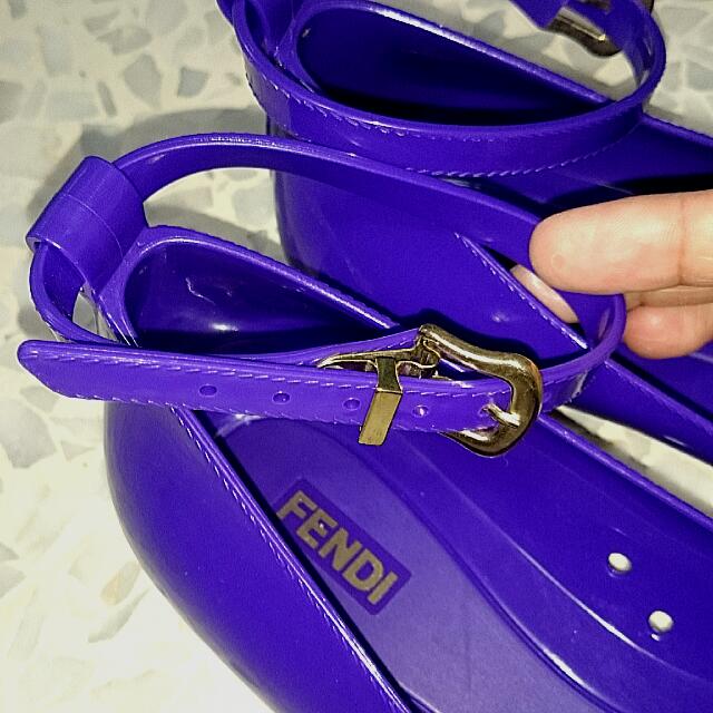 Purple peep top toe shoes