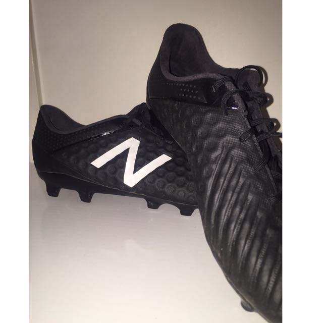 new balance football boots blackout