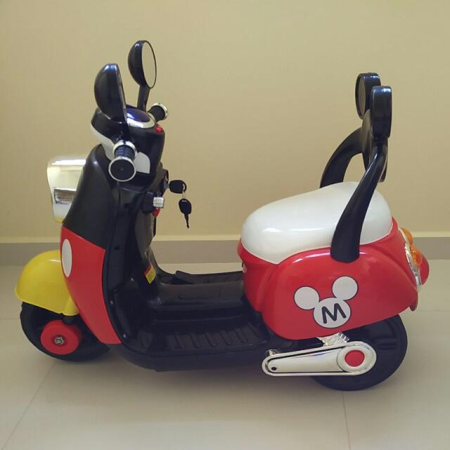 Mickey mouse motor scooter top