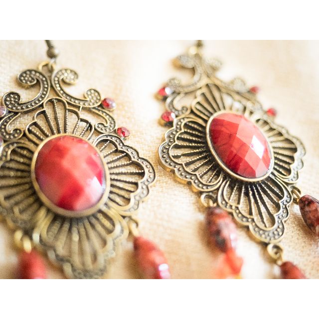 Ruby Red Dangling Earrings (Category: Earrings) located in Kuala Lumpur. Submitted by pahnanaw (Listing ID 59062854, Image 1). Description: Condition: 10/10 (Perfect/like new). Beautiful pair of earrings with intricate design. Make any outfit look more outstanding with these pair of earrings..