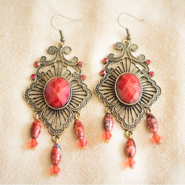 Ruby Red Dangling Earrings (Category: Earrings) located in Kuala Lumpur. Submitted by pahnanaw (Listing ID 59062854, Image 2). Description: Condition: 10/10 (Perfect/like new). Beautiful pair of earrings with intricate design. Make any outfit look more outstanding with these pair of earrings..